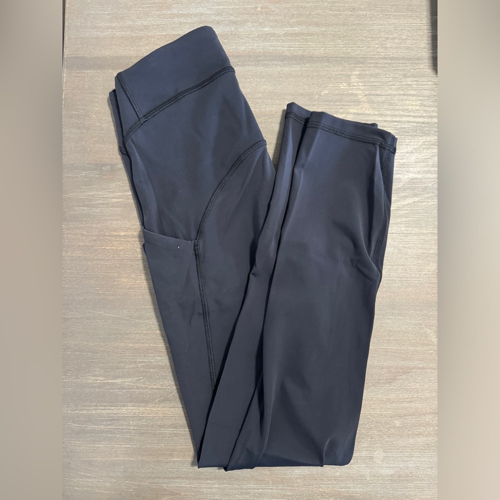 Lululemon leggings with pockets - Size 2 dark gray/light black
